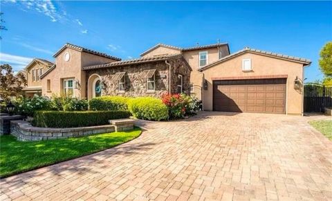 PRICE REDUCTION! Welcome to paradise in Westridge Estates! This lovely home is a delight. Completely upgraded, this is the sought-after 5-bedroom floor plan, with a separate casita. You enter through the private courtyard and patio which draws you in...