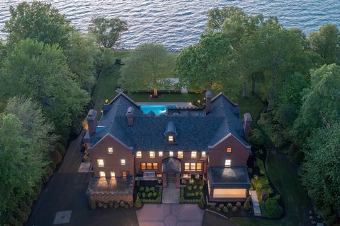 Situated on 3.5 acres along the Bratenahl coast of Lake Erie, this gilded-age grande dame underwent an extensive year-long transformation where the greatest of care was taken to bring the home into the 21st century. From the newly built bluestone pat...