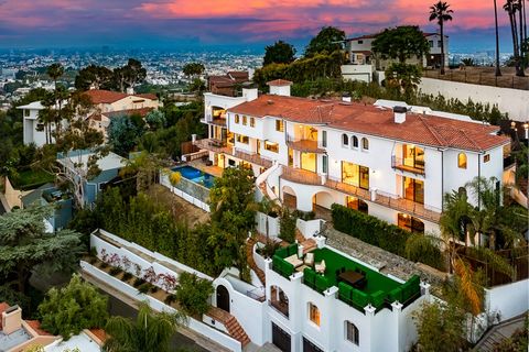 Nestled among the esteemed grand estates of Los Feliz, this captivating contemporary Mediterranean residence commands attention on a sprawling street-to-street lot, boasting one of the area's most expansive living spaces. Recently revitalized with me...