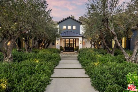 One of the finest properties in Hidden Hills, located in the prestigious Ashley Ridge estates enclave, this newly constructed contemporary farmhouse stands as a testament to sophisticated design, framed by elegantly lined olive trees that lead to the...