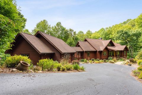 Welcome to Your Fully Furnished, Turn-Key Luxury Mountain Retreat! This stunning lodge-inspired home sits on 2.5 private acres, surroundedby serene nature at an elevation of 2,700 feet. The peaceful setting is enhanced by native, low-maintenance, dro...