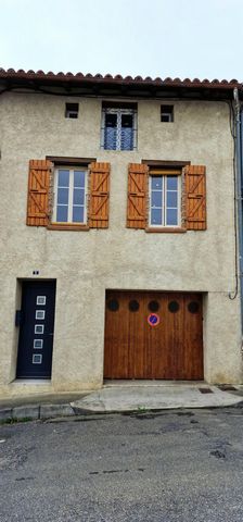 Maison de ville T3 de 127m² avec garage et jardin.