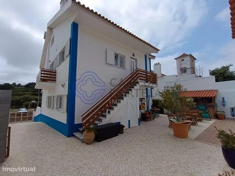 **Oportunidade Única: Moradia de Prestígio na Foz do Arelho - Lagoa de Óbidos** Descubra esta soberba moradia na Foz do Arelho, com vista para a lagoa, sem demoras. Com os seus 275 m² de área útil e 348 m² de área construída, é muito mais do que uma ...