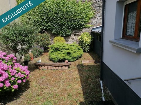 Petite maison de ville avec garage .