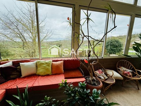 PROCHE COMMERCES 2 CH + 1 BUREAU VERANDA JARDIN STATIONNEMENTS