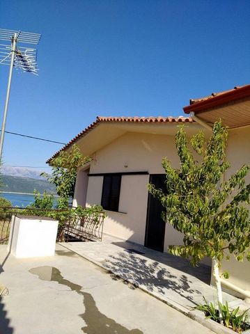 Rivio Amvrakias. For sale a  detached house overlooking Lake Amvrakias. The main house of 95 sq.m. consists of two bedrooms, living room, dining room and kitchen with fireplace,bathroom and WC. The house located on the plot of 830 sq.m. and has the o...