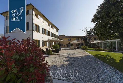 This exclusive luxury property girdled by Treviso's countryside is currently up for sale. This three-floored elegant estate displays classical style façades with symmetrical openings and a string course in order to highlight its timeless eleganc...
