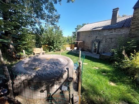 Magnificent stone house nicely renovated and decorated with a surface area of approximately 110 M2 with on the ground floor: a living room of 40 M2 with open fireplace and access to the terrace and the garden, 1 independent kitchen with colored appli...