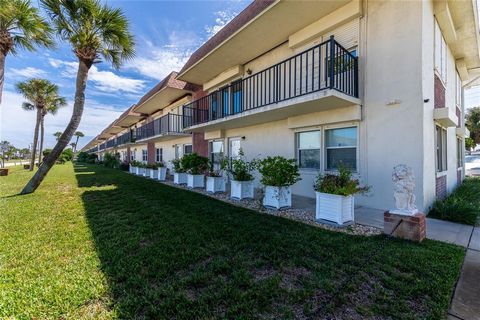 Step into this inviting ground floor, end unit condo in Winchester Manor, a vibrant 55+ community. Perfectly positioned across from a Publix shopping center and a short stroll to the beach, this residence is a true gem. Immerse yourself in modern ele...
