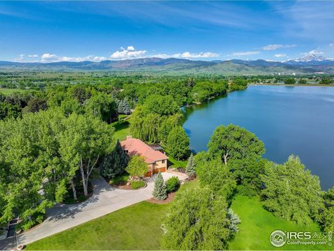Pass through picturesque gates, down the private drive and expansive motor court to reach this one-of-a-kind residence where lake and mountain views inspire. Surrounded by lush landscaping, on the shores of Burch Lake, the level of privacy is unmatch...