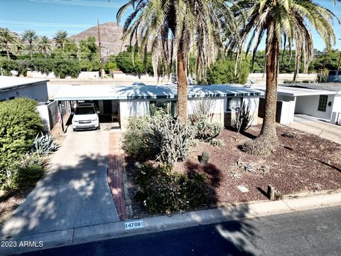 Arizona Canal lot, ideal for redevelopment. Camelback Mountain vistas. Convenient to shopping, restaurants and schools.