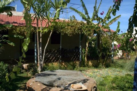 Stay in this amazing holiday home that offers a really good vibe since it is located extremely close to the beach. There is a nice garden with home-produced vegetables and herbs. The view that offers this house is totally amazing. It is suitable for ...