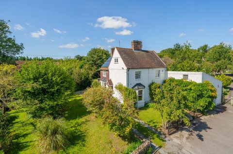 £825,000 - £875,000 Guide Price. Historic four/ five bedroom family home. Old Mill - with development potential. Three generously size reception rooms. Principal bedroom with en-suite. Charming period features + solar panels. Mature pretty gardens. E...