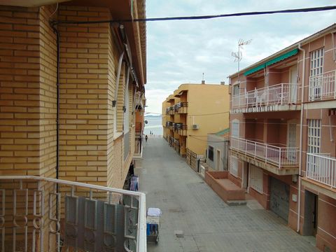 This delightful 3 bedroom 1st floor apartment is just 100m from the beach in Los Alcazares, on the Mar Menor. Through the front door you enter the hallway which accesses 3 good size bedrooms with fitted wardrobes, a spacious family shower room and a ...