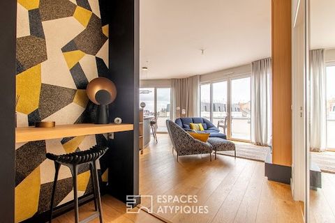 Located a stone's throw from the station, in a recent and secure residence, this luxury apartment, particularly well appointed, offers a living space of 75m2, supplemented by its roof terrace of more than 47m2 with panoramic views of the city and its...