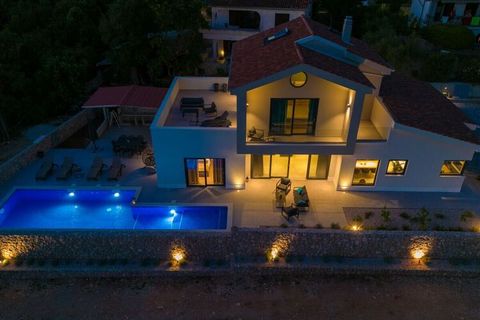 Maison de vacances de luxe avec piscine privée et belle vue sur la mer pour 7 personnes.