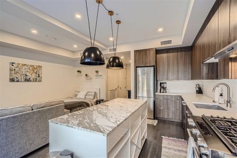 Turnkey investment opportunity in high demand LoHi Denver neighborhood! This luxury low- maintenance condo completed at the end of 2019 is fully furnished with name-brand furniture. Enjoy immediate return on your investment! The unit features an open...