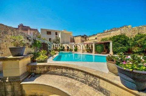 Lovingly CONVERTED HOUSE OF CHARACTER located in one of Balzan’s best residential streets. This property enjoys a magnificent entrance hallway that leads directly onto the central courtyard and extensive back garden. The house has four bedrooms, thre...