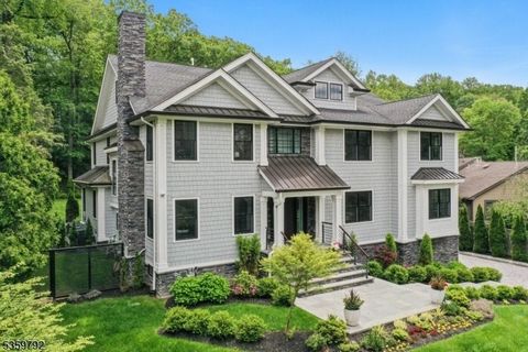 Welcome to 290 Long Hill Drive, an exceptional build completed in 2021. This blend of luxury, comfort & functionality is a labor of love. Sited perfect on over half an acre of Short Hills property with 7 beds & 8.1 baths boasts a heated saltwater poo...