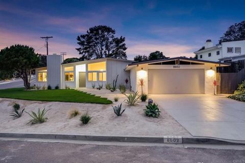 Mid-century modern elegance meets contemporary comfort at this fully renovated single-level home in coveted La Jolla Scenic Heights. Perched on a quiet cul-de-sac corner lot spanning over 11, 500 sq ft, this 4-bedroom, 2.5-bath residence showcases ic...