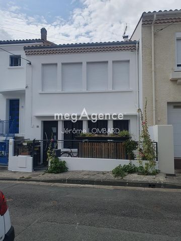 Maison de ville proche commerce et plage