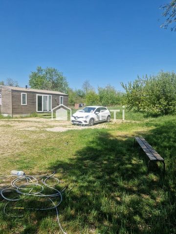 terrain avec mobil home ,eau et électricité