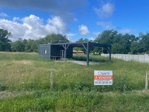 Terrain constructiblede 3612m² avec une dalle de 150m² et 1 hangar